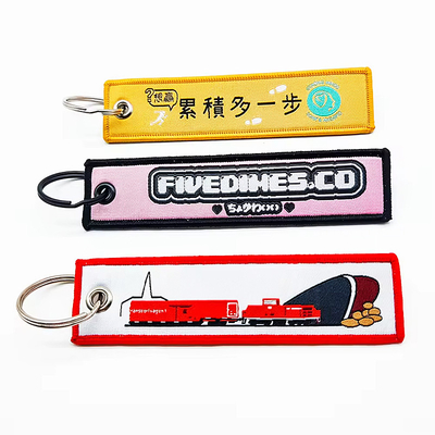 Tejido de tela personalizada bordado de motocicleta en blanco llavero de anime bordado llave jet etiqueta para automóvil y motocicleta