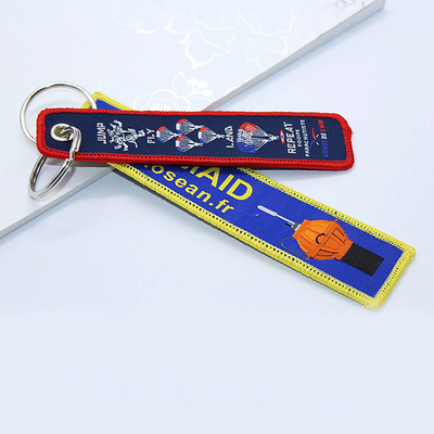 Clavier personalizado de poliéster bordado Jet Tag Tejido tecido llavero con su logotipo