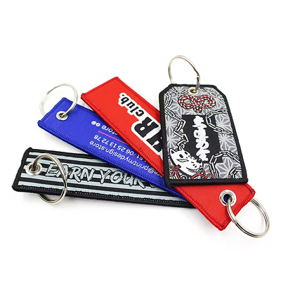 Cosida de carabinero personalizado bordado tejido jet tag portador de llaves águila pico negro correa de muñeca llavero de cordón
