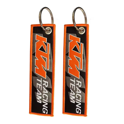 Regalos promocionales con logotipo personalizado Jet Tag Tejido bordado llavero de coche llavero tejido
