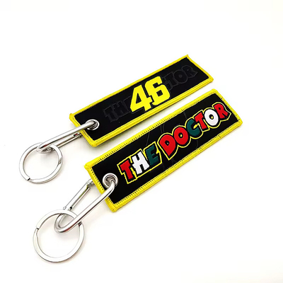Regalos promocionales con logotipo personalizado Jet Tag Tejido bordado llavero de coche llavero tejido