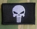 El eje de balancín del castigador de la bandera del cráneo bordó el hierro en los remiendos Front Biker Vest Mini Patch